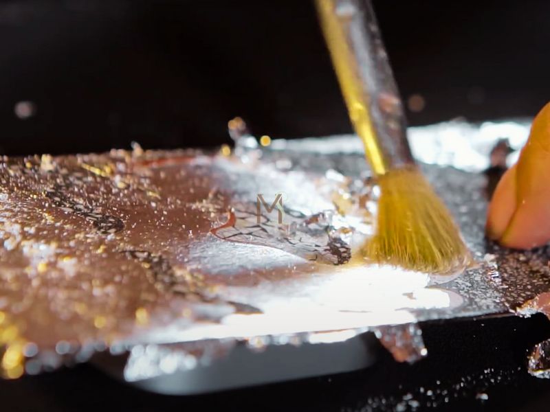 Applying Gold Leaf Details On A Vietnamese Lacquerware Tray