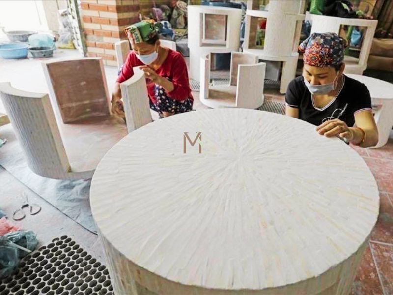 Craftsman Carefully Sanding The Tea Table After Mother Of Pearl Inlay For A Smooth Finish